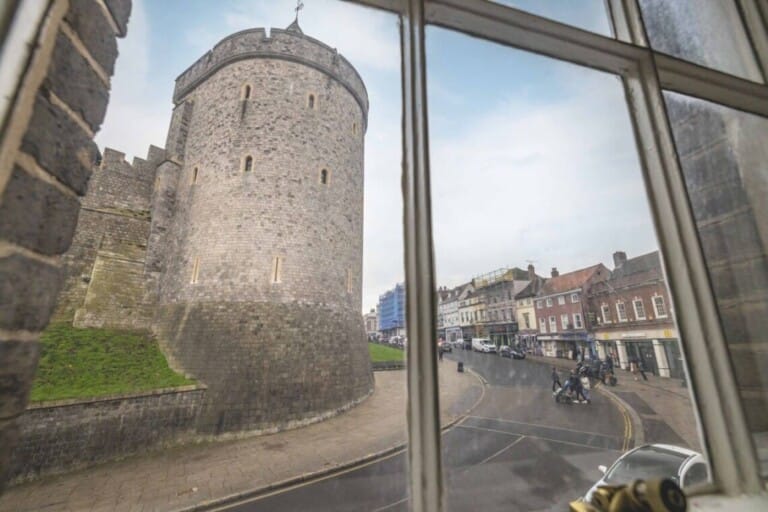 View of Windsor Castle and Thames Street through the apartment window at Consorts & Concubines.